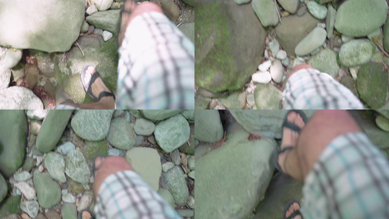自然界中的Vlogging。一个独自旅行者在水中行走的视点。山河。