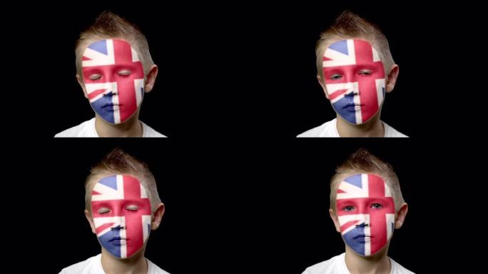 英格兰足球队的悲伤球迷。一个脸上涂着民族色彩的孩子。