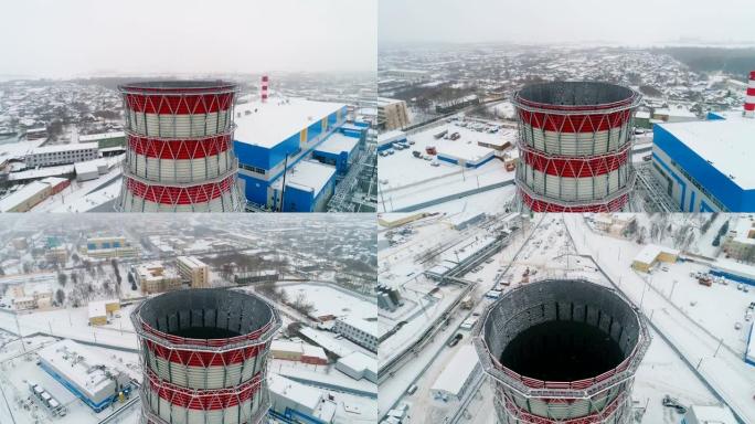 在下雪的天气中，热电电站上方的塔