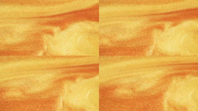 五颜六色的金沙在宏观上有机地在五颜六色的液体中移动