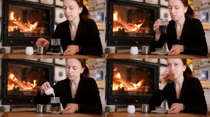 女人在壁炉旁品尝越南咖啡