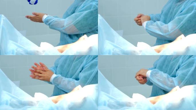 外科医生在医院手术室手术前处理手防腐剂。