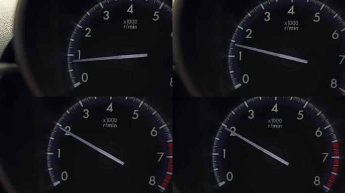 在车辆仪表板的转速表或速度计上加速
