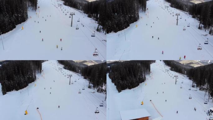 冬季滑雪场上滑雪者和滑雪缆车的滑雪场鸟瞰图