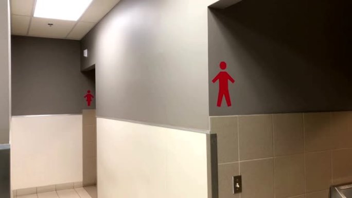 4k分辨率墙上男女洗手间标志的运动