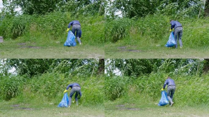 迷人的女人把废物收集到河岸的垃圾袋里。女志愿者在公园清理垃圾。4K
