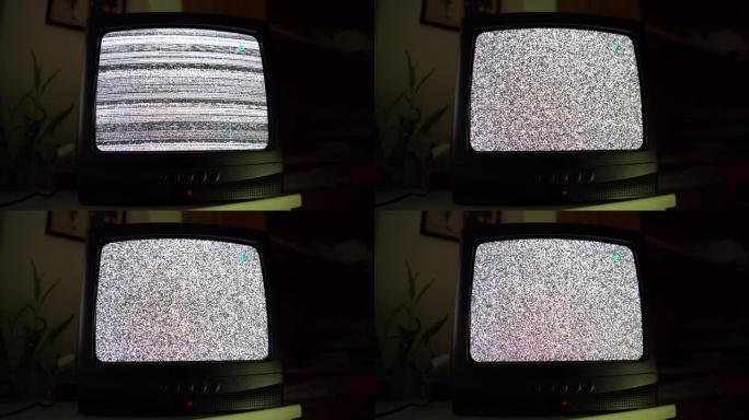 黑暗房间中的老式电视传输，带有噪声失真和不良信号的复古电视屏幕，旧电视屏幕上的黑白纹理效果