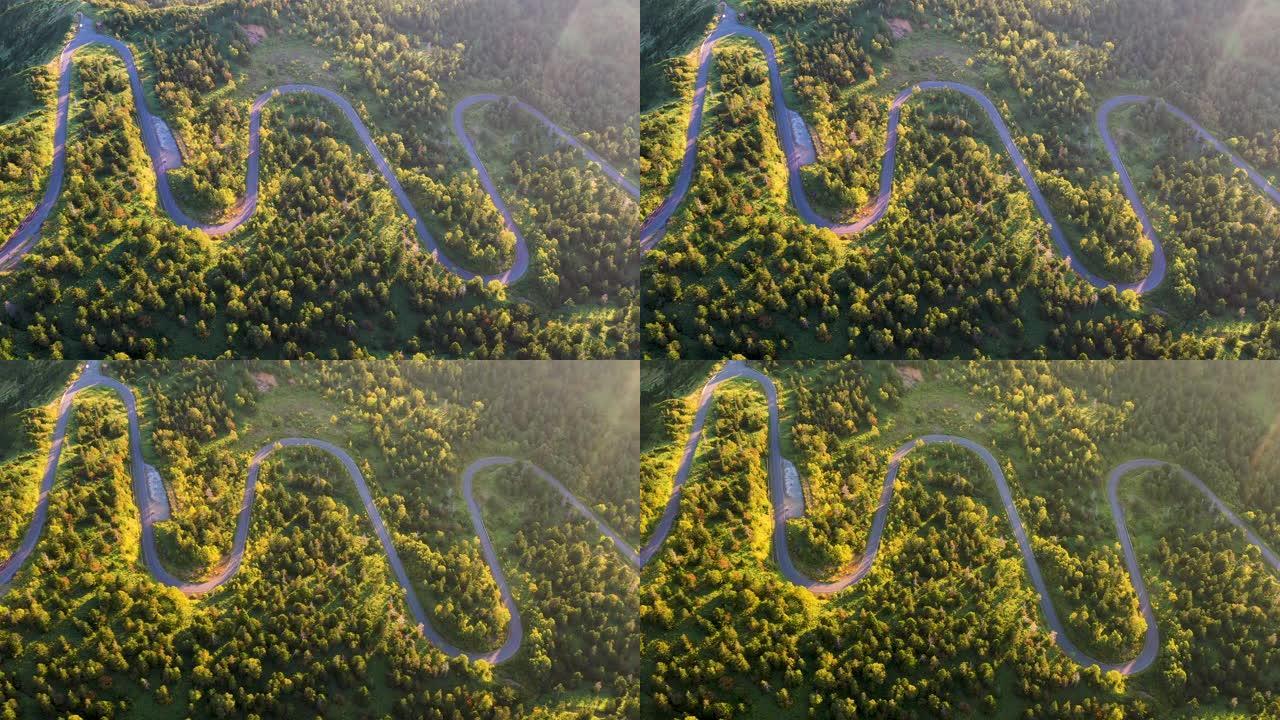 秋天山上蜿蜒道路的鸟瞰图