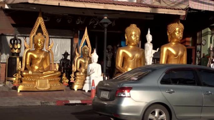泰国曼谷街上商店的佛像。