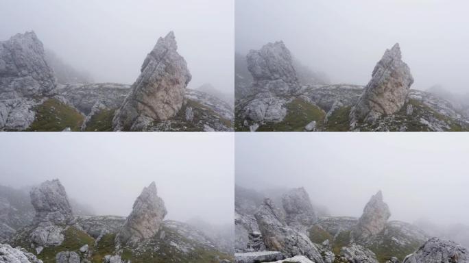 在雾中飞过岩石云雾大雾石头山石山顶山上