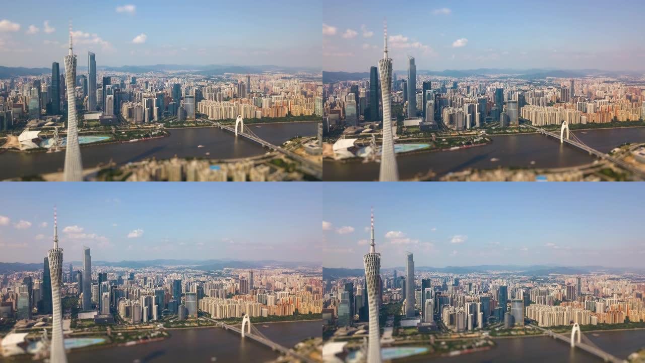 阳光明媚的日子广州市中心珠江广州塔侧空中倾斜移动全景4k延时中国