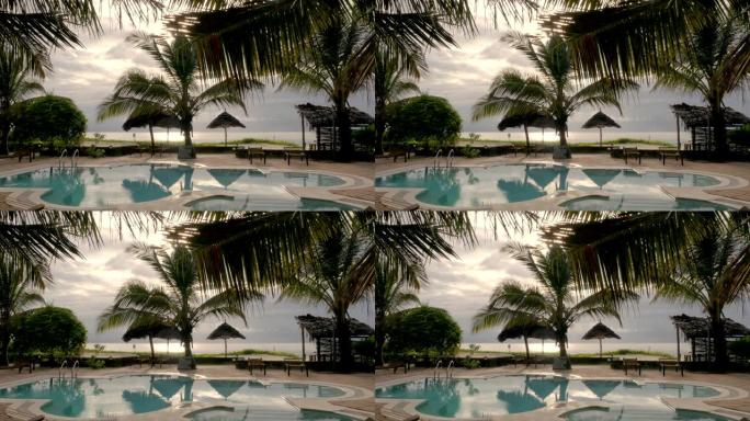 在坦桑尼亚桑给巴尔的一个度假胜地，游泳池和棕榈树