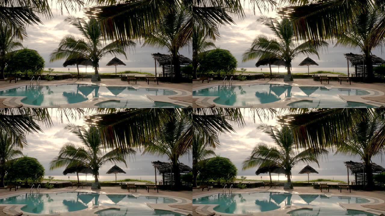 在坦桑尼亚桑给巴尔的一个度假胜地，游泳池和棕榈树