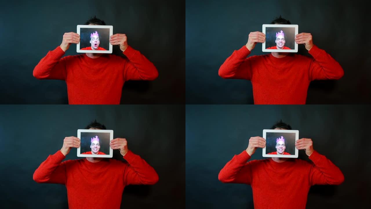 一个人手里拿着平板电脑的肖像。