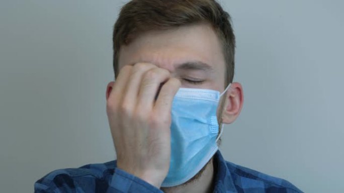 冠状病毒被感染的人在咳嗽。年轻高加索男性咳嗽的肖像。流感流行。病毒保护。大流行。冠状病毒。新型冠状病