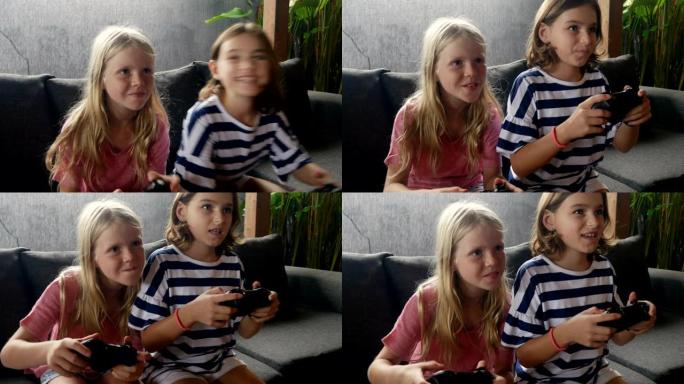 两个快乐微笑的年轻女孩一起玩电子游戏