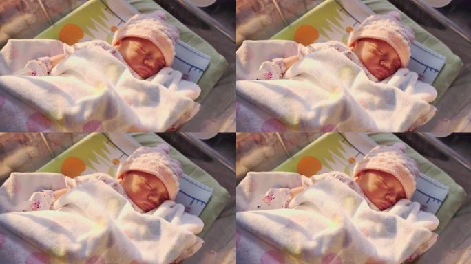 新生女婴出生后在医院睡觉