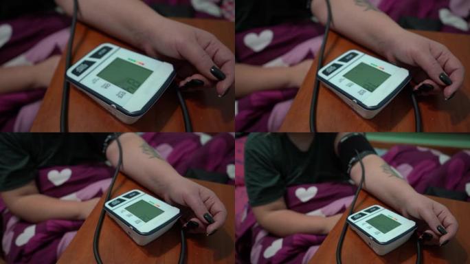 使用眼压计测量血压。血压计测量女性的压力。眼压计显示器上的数字。低血压。