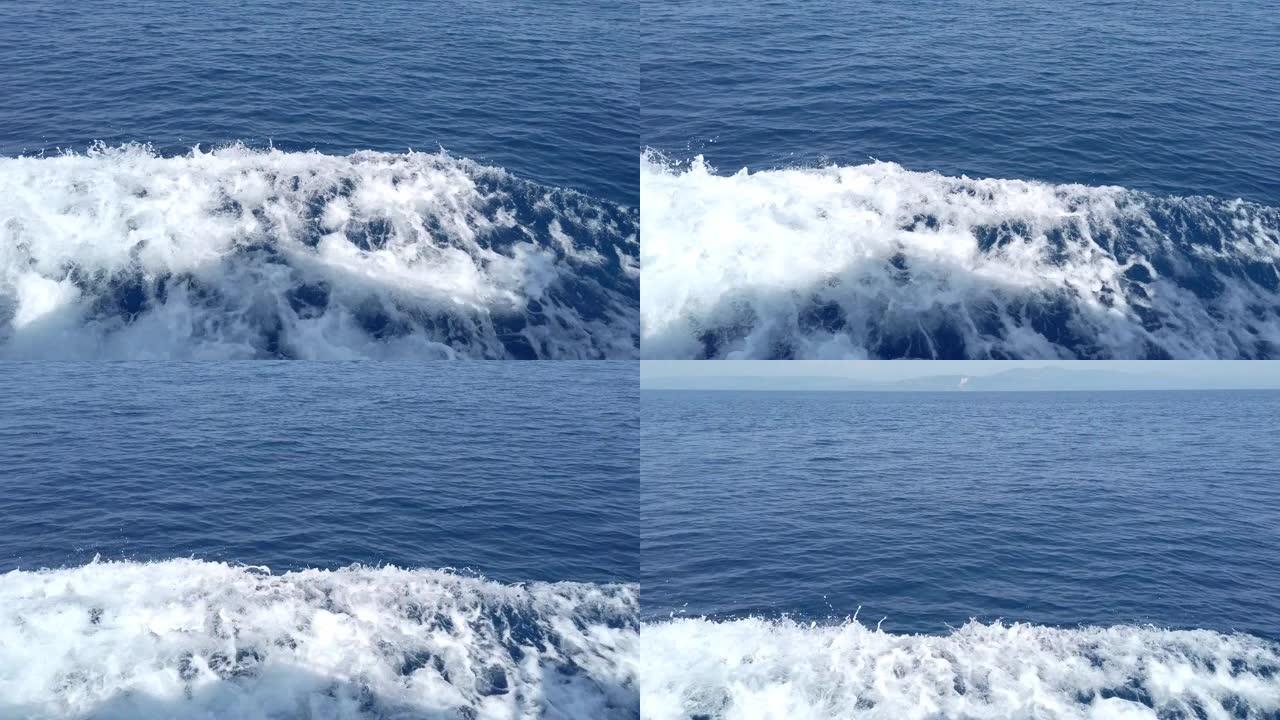 深绿松石和蓝色地中海，船上有白色泡沫