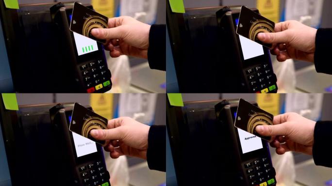 超市结帐时用信用卡进行非接触式支付-4k分辨率