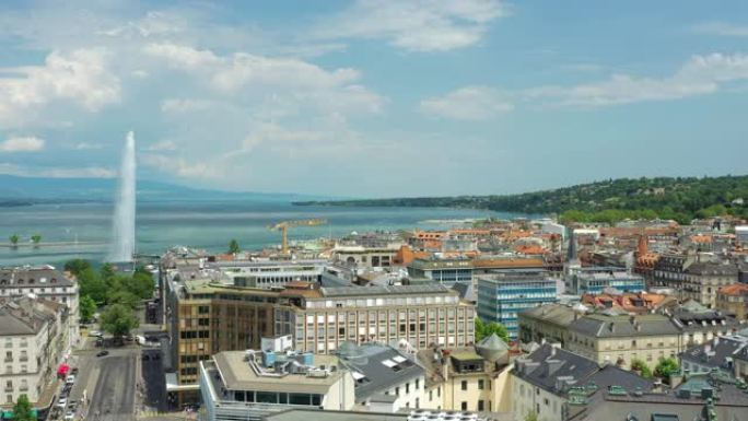 阳光明媚的一天飞越日内瓦中心城市景观湖边喷泉空中全景4k瑞士