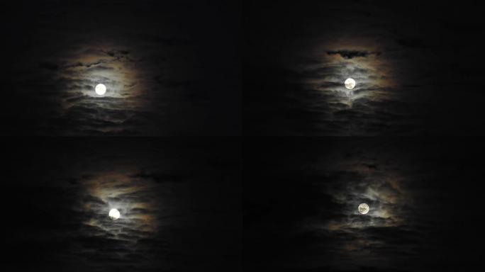 薄的高积云中满月周围日冕的时间流逝