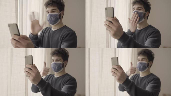 戴着口罩的年轻病人在住院期间通过视频通话向家人致意
