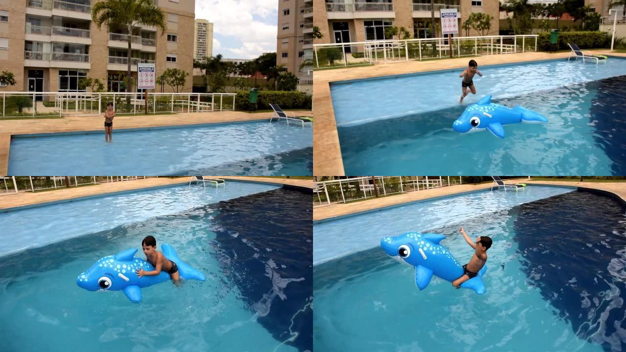 6岁的孩子在游泳池里玩海豚彩车。