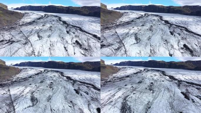 冰岛融化的Solheimajokull冰川的空中4k无人机高角度视图。气候变化，冰川融化，全球变暖概