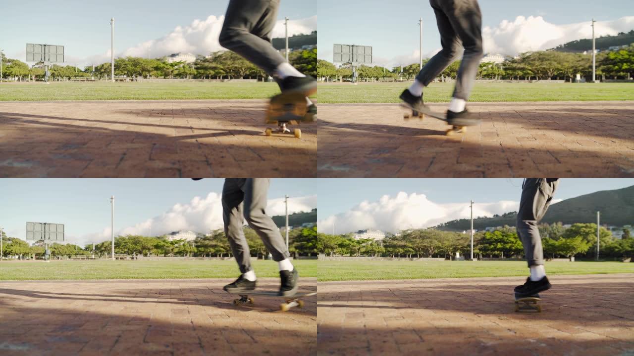 男性滑板运动员在公园的滑板上保持脚平衡-滑板运动员在公园里做戏