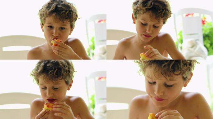 儿童吃桃子水果小男孩吃健康食品肖像