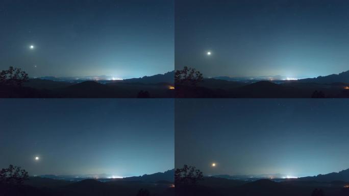 4k视频中的时间流逝。星状排列现象 (土星，月亮，金星，木星) 在山上薄雾笼罩的夜空中，长时间曝光，