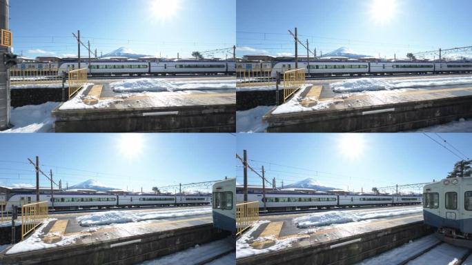 背景是富士山的火车站。