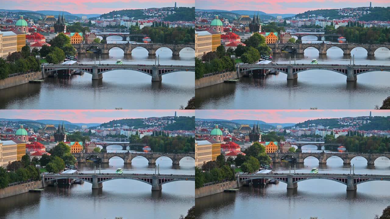 捷克共和国布拉格伏尔塔瓦河上桥梁的日落场景