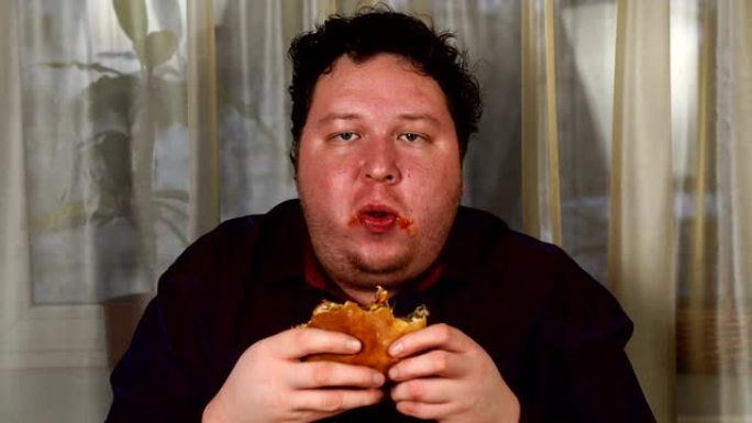 胖子贪婪地吃汉堡肥胖减肥