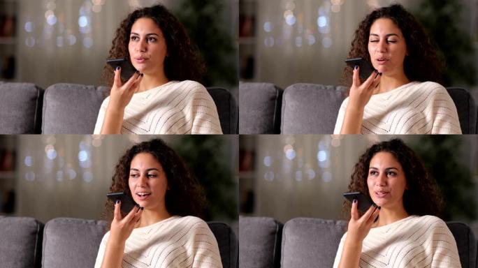 快乐的阿拉伯女人在电话上使用语音识别