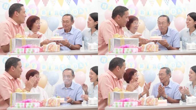 亚洲老年人与家人庆祝生日