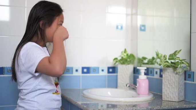 亚洲女孩孩子戴防病毒面具防止和保护病毒