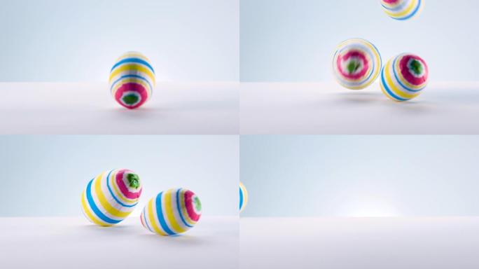 复活节彩蛋以慢动作掉落到白色背景上