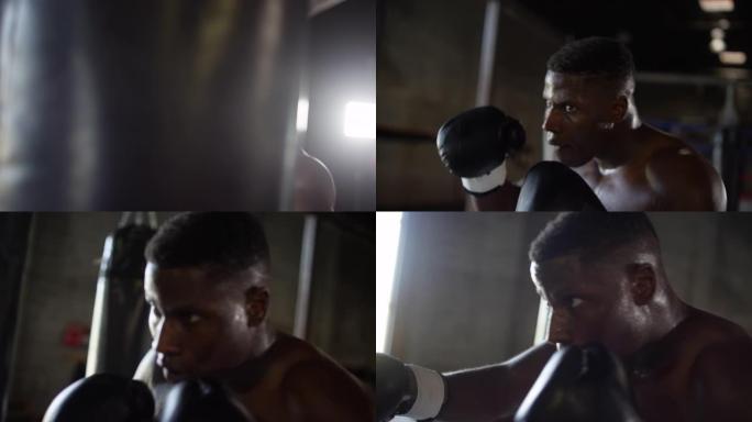 非裔美国拳击手击中沉重包的动态镜头