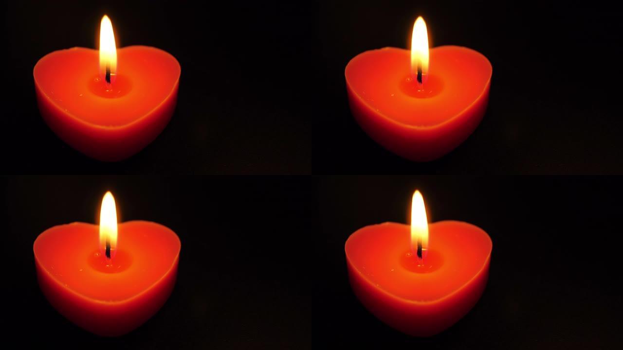 单身心形蜡烛燃烧无限无缝循环的视频背景情人节