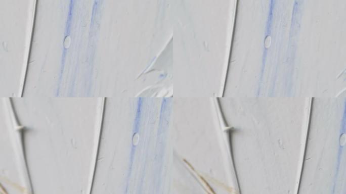 美丽的抽象背景画。白色和蓝色丙烯酸色背景纹理。运动4k视频，4096x2160镜头