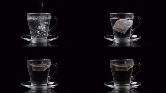 在玻璃茶杯中，倒入开水并放下茶袋，在黑色背景上很大