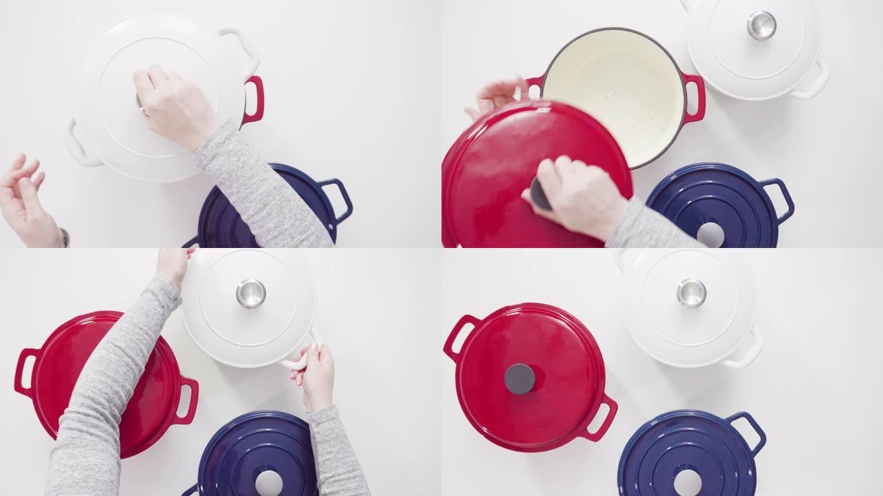 红色、白色和蓝色搪瓷铸铁覆盖的荷兰圆形烤箱
