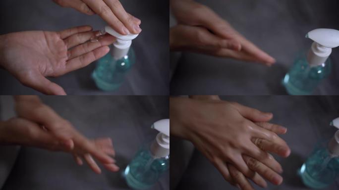 4k女人手涂洗手液凝胶预防细菌，冠状病毒2019，covid19，在家自我预防，杀灭细菌，洗手，手蓝