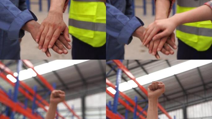 戴安全帽的女员工和男员工在仓库里用电子平板检查库存，双手紧握，以配合团队合作的理念