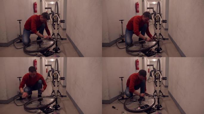车间里的机械师用自行车车轮操纵。