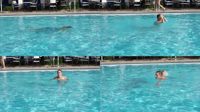 男子在水下游泳，从游泳池的水中浮出水面