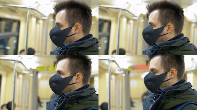 地铁车厢中戴着防护面具的人
