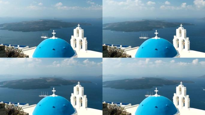 爱琴海与圣母玛利亚天主教堂圣托里尼岛Fira的三个钟声。
